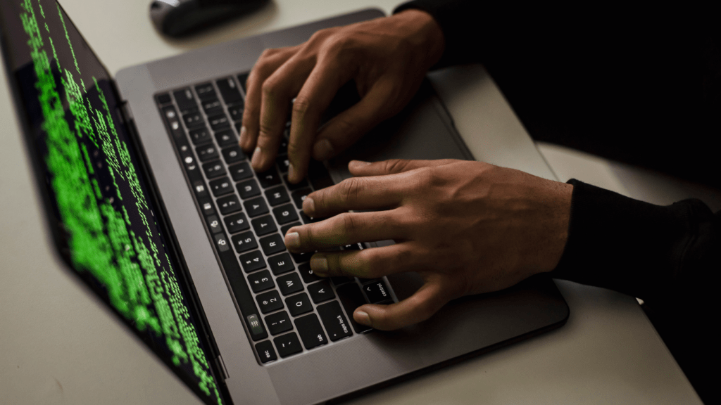 a person typing on a computer