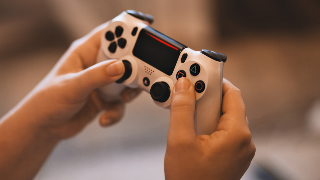 a person holding a game controller