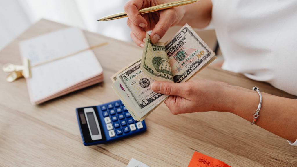 a person is counting a money