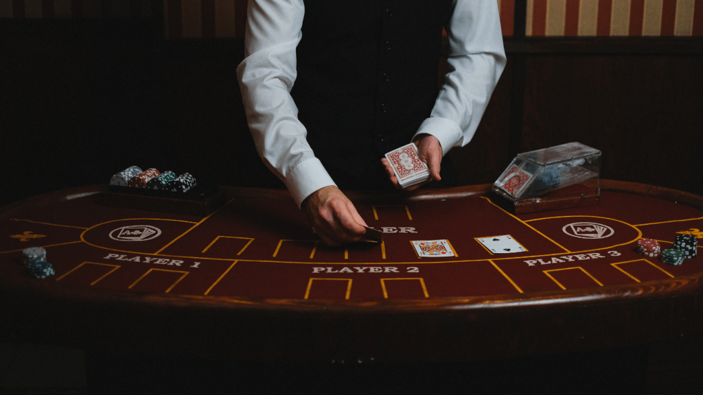 man displaying cards in casino